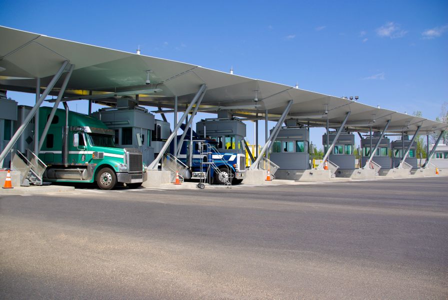 Tractor units at a border inspection booth