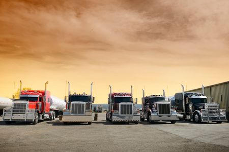 Fleet of tractor units parked at a terminal