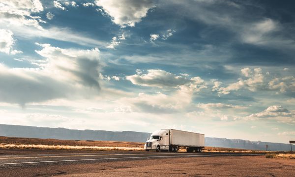 Tractor-trailer on an open desert highway